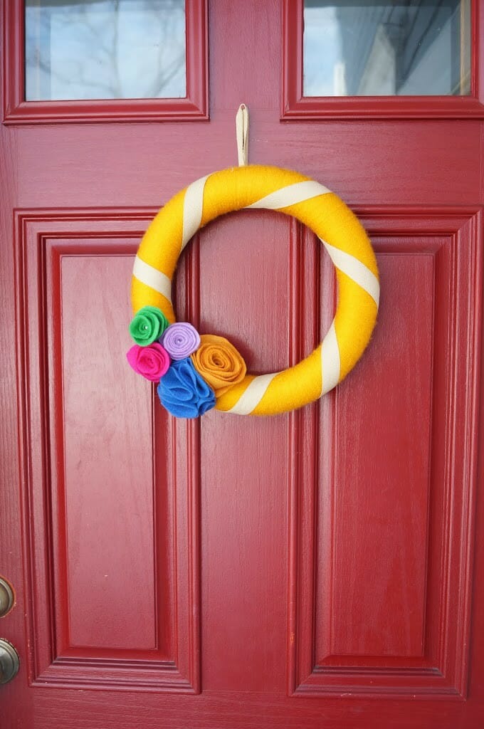 Yarn Wrapped Wreath with Felt Flowers on my front door