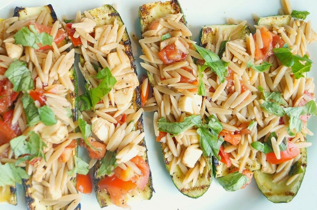 Grilled zucchini stuffed with caprese