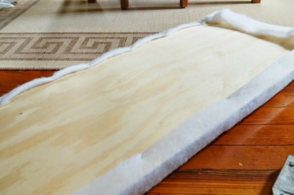 Batting wrapped around plywood