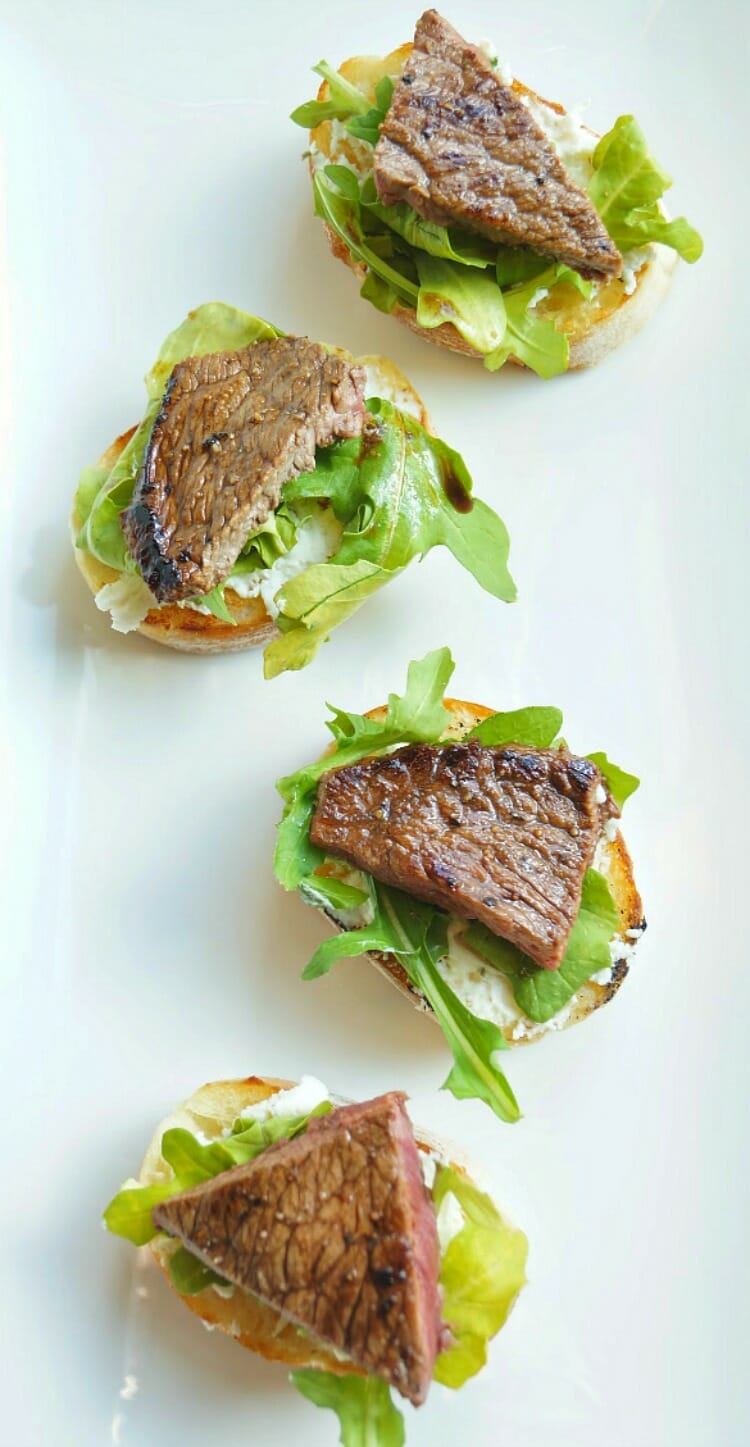 Balsamic Beef Crostini with Herbed Cheese and Arugula