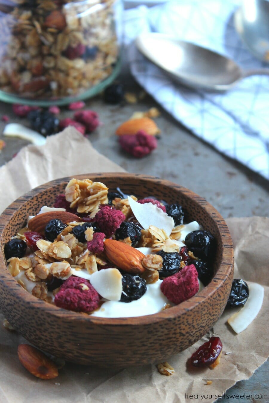 Toasted Summer Berry Granola; crispy, crunchy, sweet summer berry granola with oats and coconut. So delicious, you'll want to eat it by the handful!