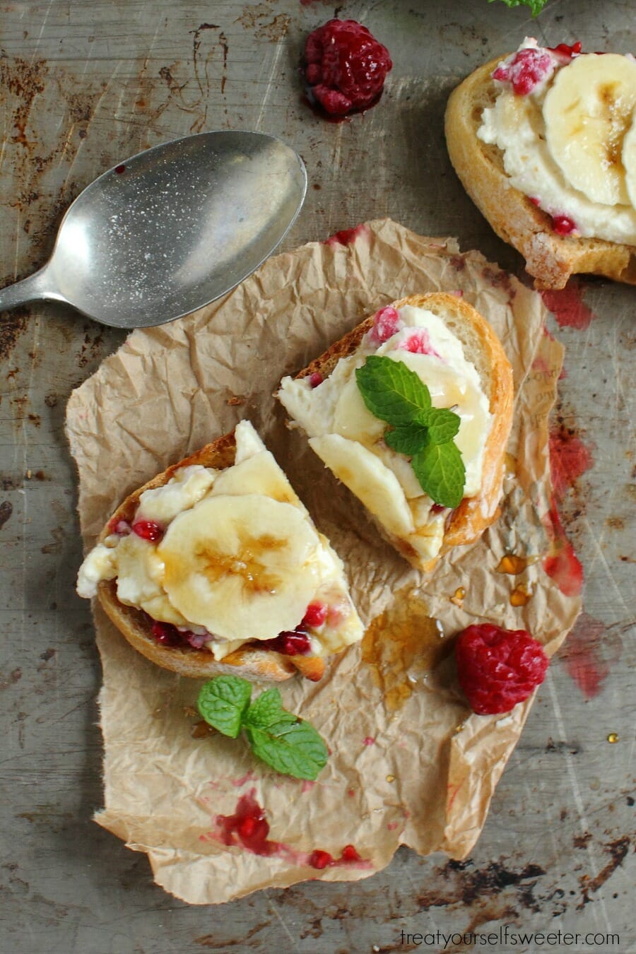 Honey Ricotta Toast with Raspberries and Banana; crunchy toast smothered with creamy, sweet honey ricotta, raspberries and banana. Quick, easy & perfect for brunch!