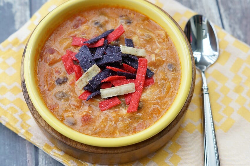 Cheesy Chicken Enchilada Soup: Takes only 20 minutes to make and is a copycat version of Chili's Enchilada Soup!