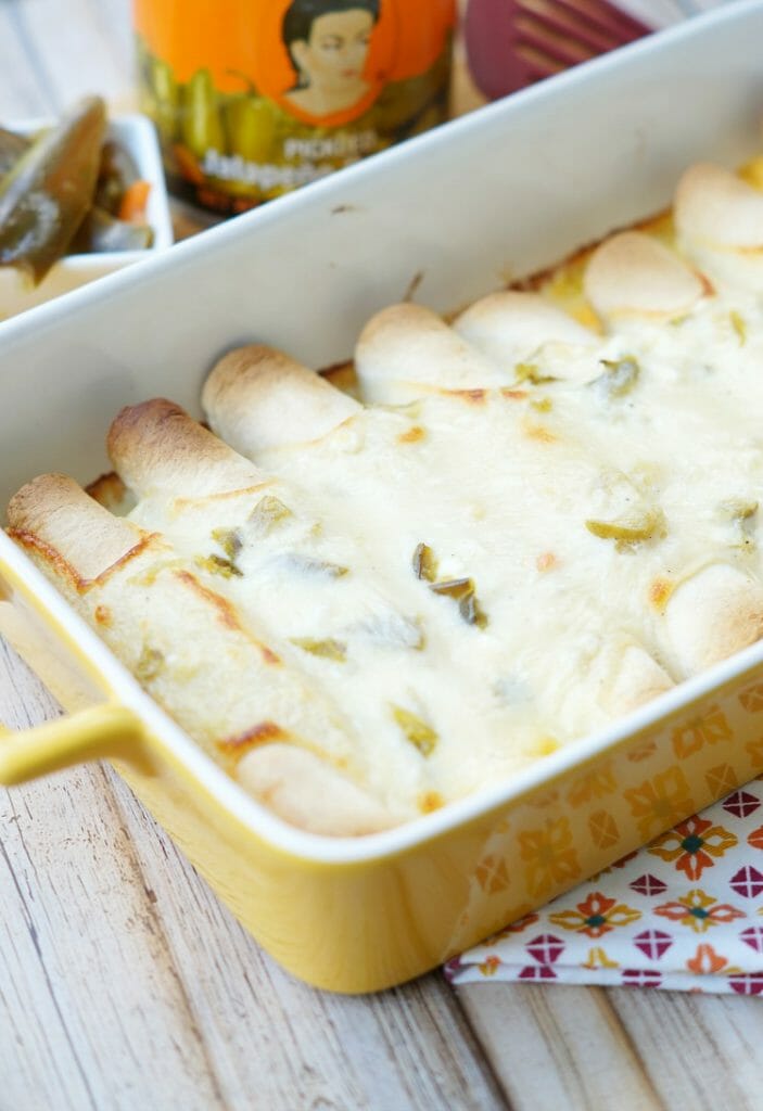 Creamy Jalapeno Queso Chicken Enchiladas