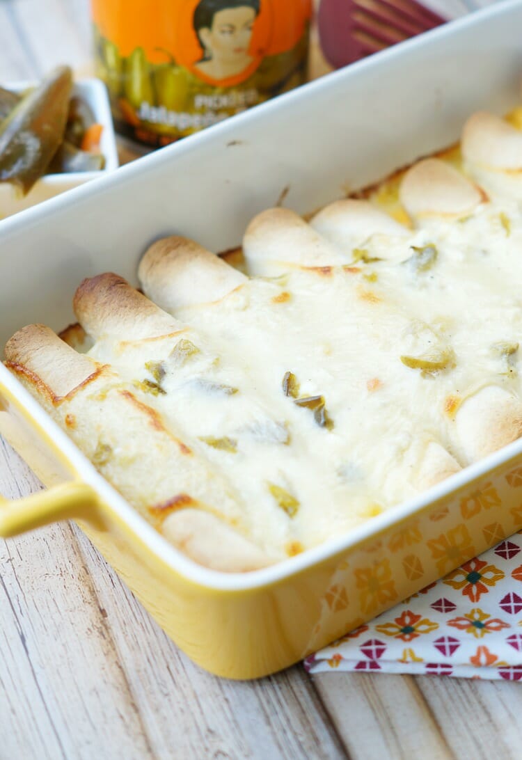 Creamy Jalapeno Queso Chicken Enchiladas
