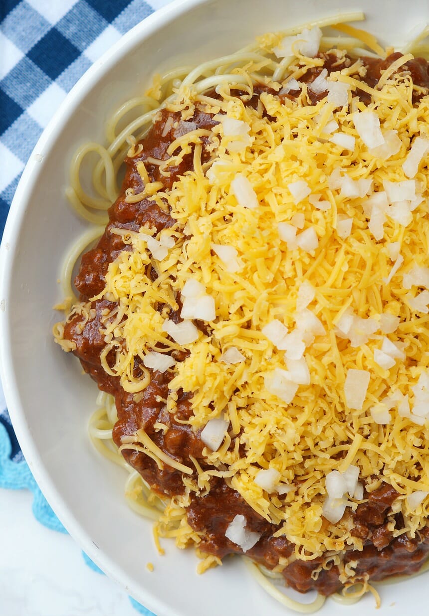 Instant Pot Cincinnati Chili topped with cheese and onion