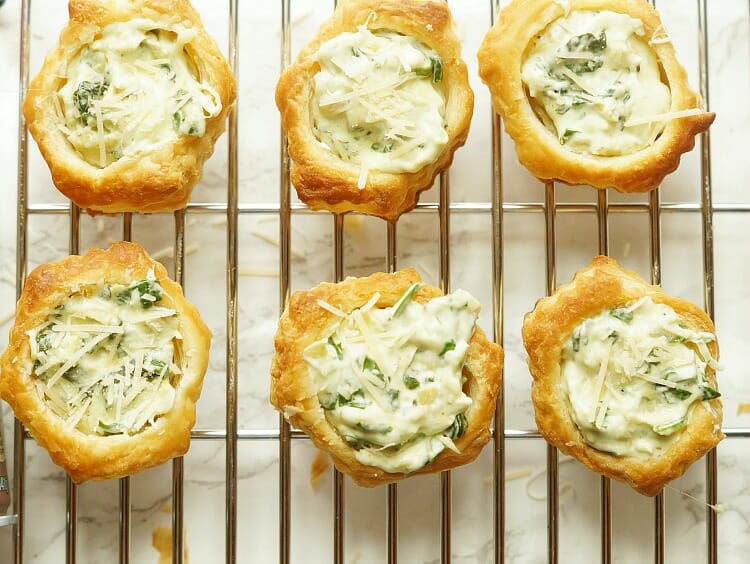 Spinach and Artichoke Puff Pastry Cups on a cooling rack