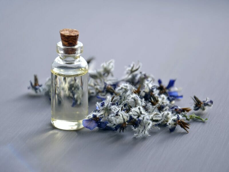 Selective Focus Photo of Bottle With Cork Lid