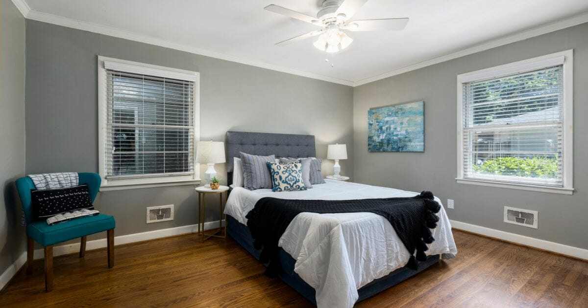 gray bed in the bedroom