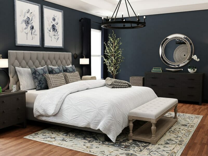 a bedroom with blue walls and a large bed