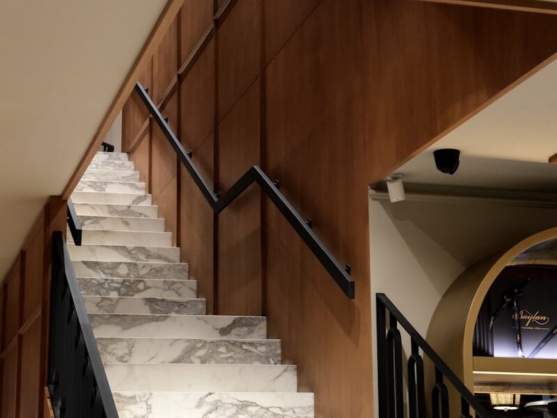 a set of stairs leading up to a living room