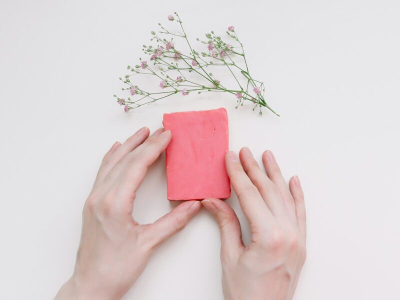 hands holding a red card