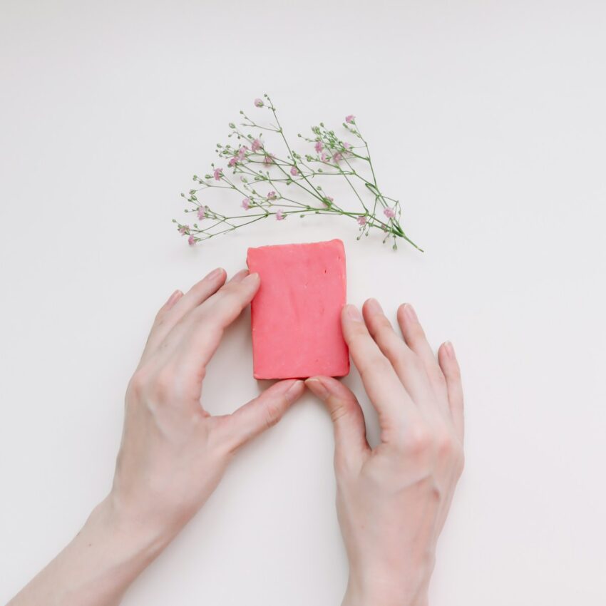 hands holding a red card