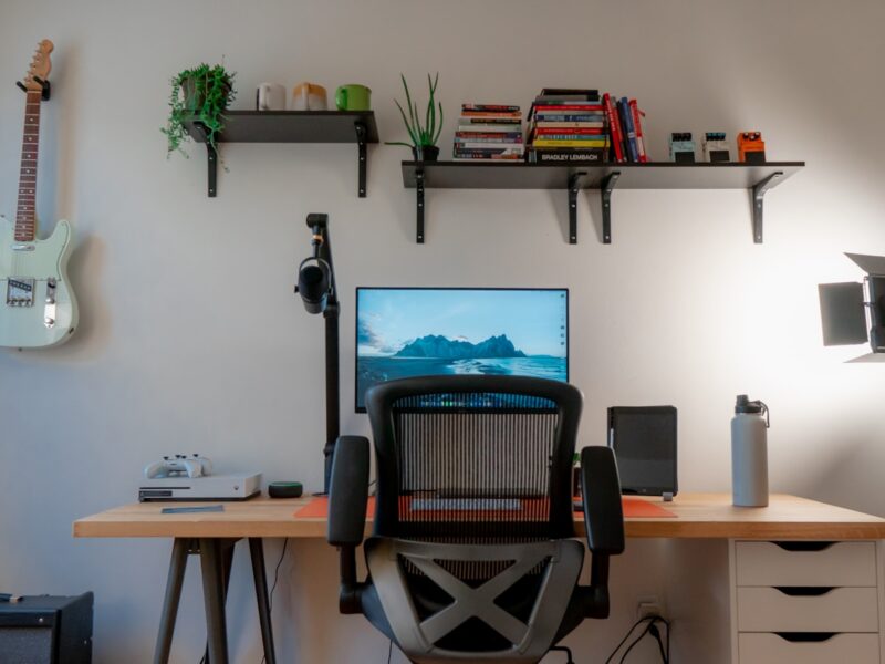 black and red office rolling chair