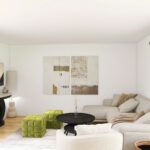 a living room with a tv and couches