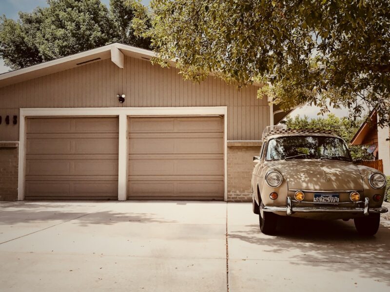 white vehicle near tree