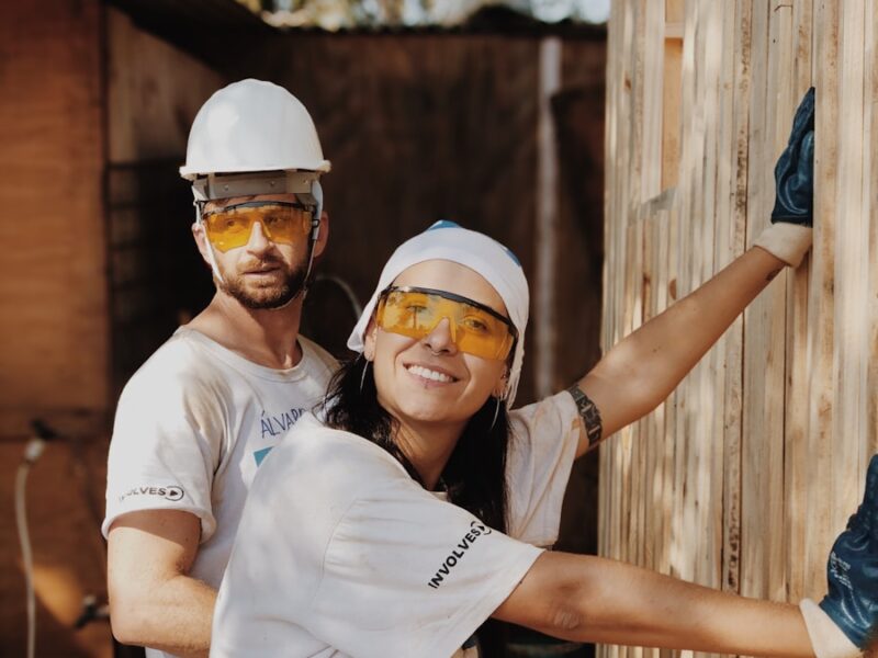 woman in white shirt wearing white helmet