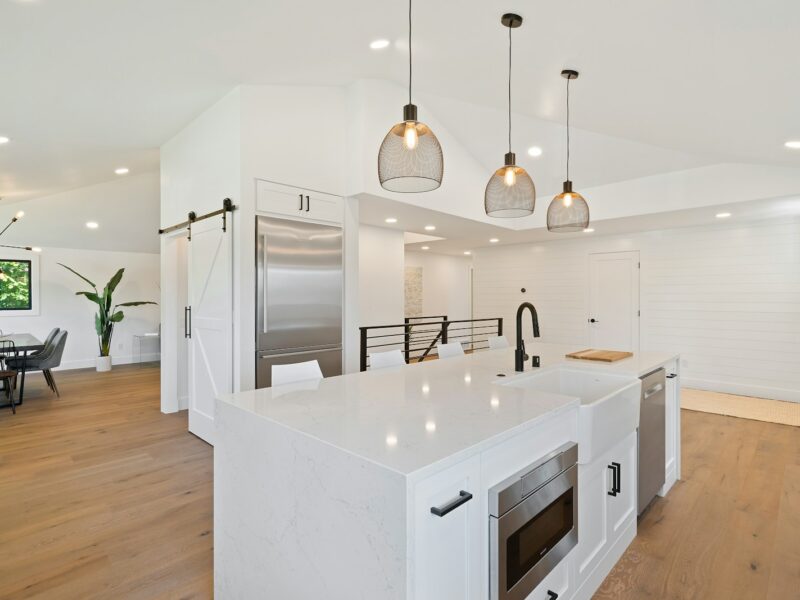 turned on pendant lamps above kitchen island