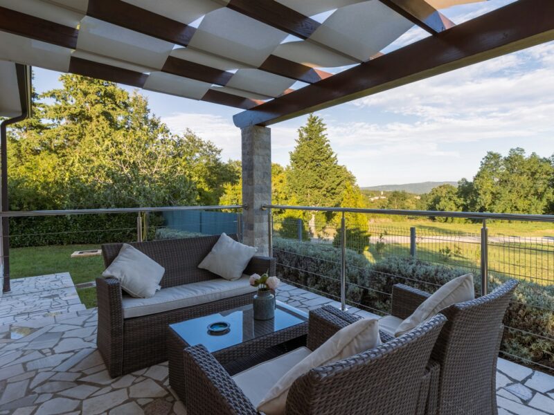 brown wicker chairs and table