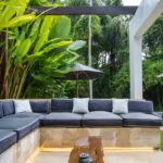 A living room with a couch and a table