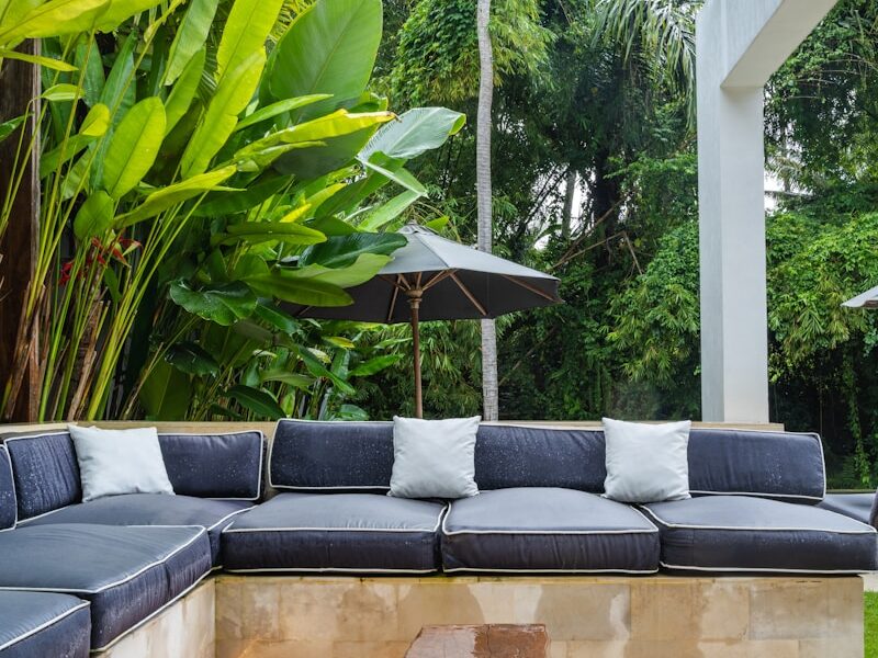 A living room with a couch and a table