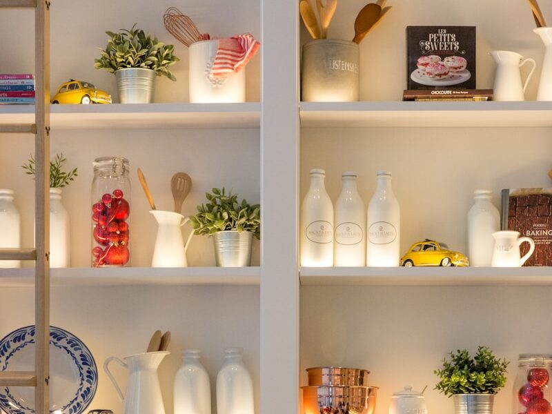 white ceramic bottles on shelf