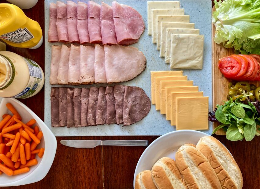 a variety of food is laid out on a table