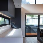 a kitchen with a large window