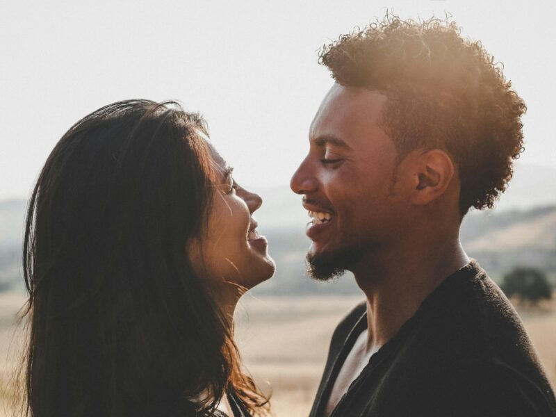 man and woman facing