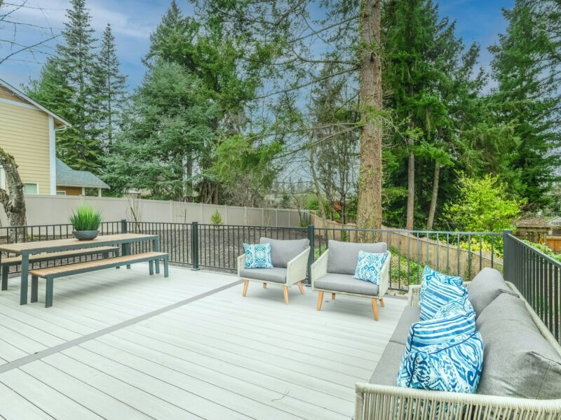 white wooden bench on wooden deck