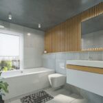 a bathroom with a toilet, sink, and bathtub