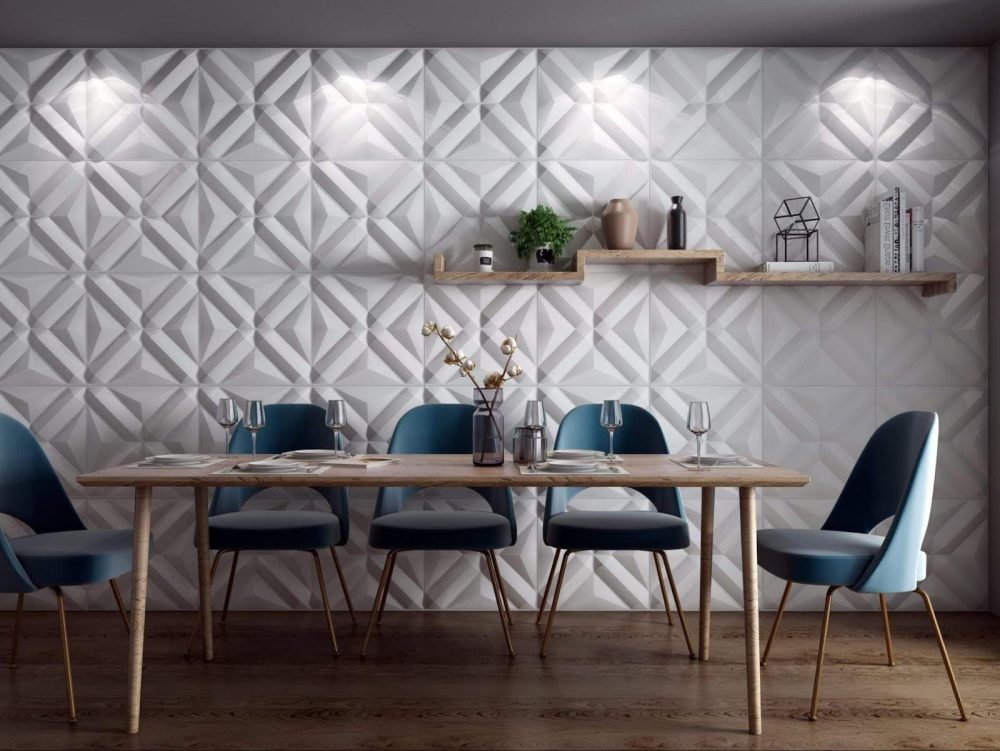 Modern dining room with geometric wall, wood table, and chic blue chairs.