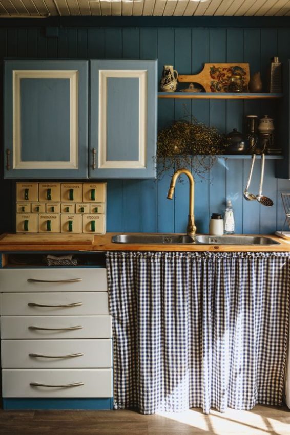 checkered curtains and vintage decor elements give a cottage feel
