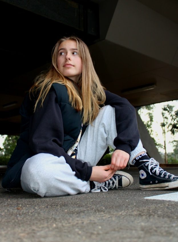 a person sitting on the ground