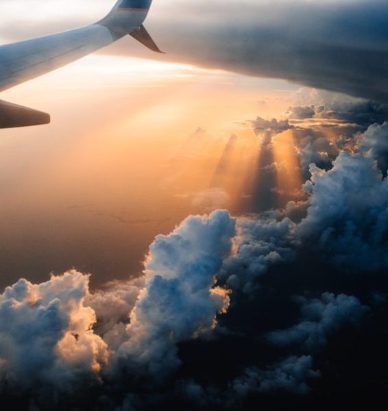 airplane on sky during golden hour