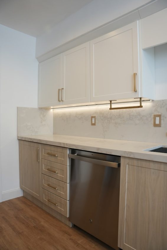 a kitchen with a dishwasher and a sink