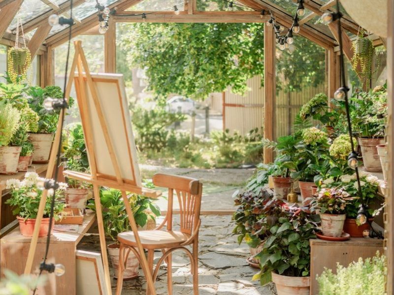 A garden filled with lots of potted plants
